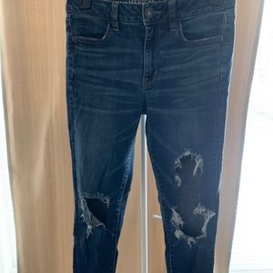 Dark wash distressed skinny jeans